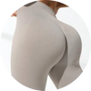 Damen High Waist Sport Leggings in beige, nahtlos, atmungsaktiv, ideal für Fitness und Yoga, Push-Up Design, mit sportlichen Schuhen.