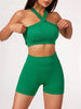 Damen Yoga-Set in grün mit High Waist Shorts und Träger-Sport-BH, ideal für Training und Alltag.