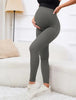 Schwangerschafts-Yogahosen in Grau, atmungsaktiv und elastisch, perfekt für schwangere Frauen, trendy und bequem.